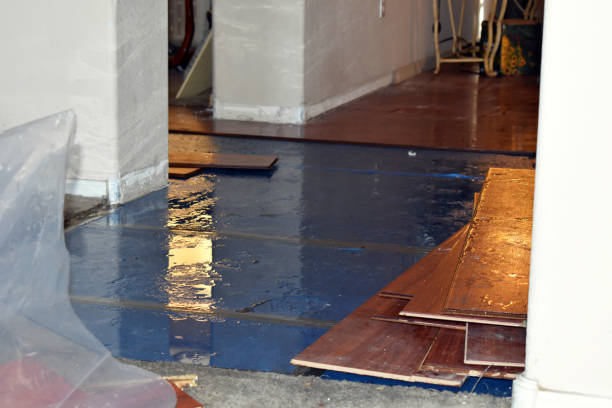 Professional Flood Damage Restoration technician working in Etna, OH